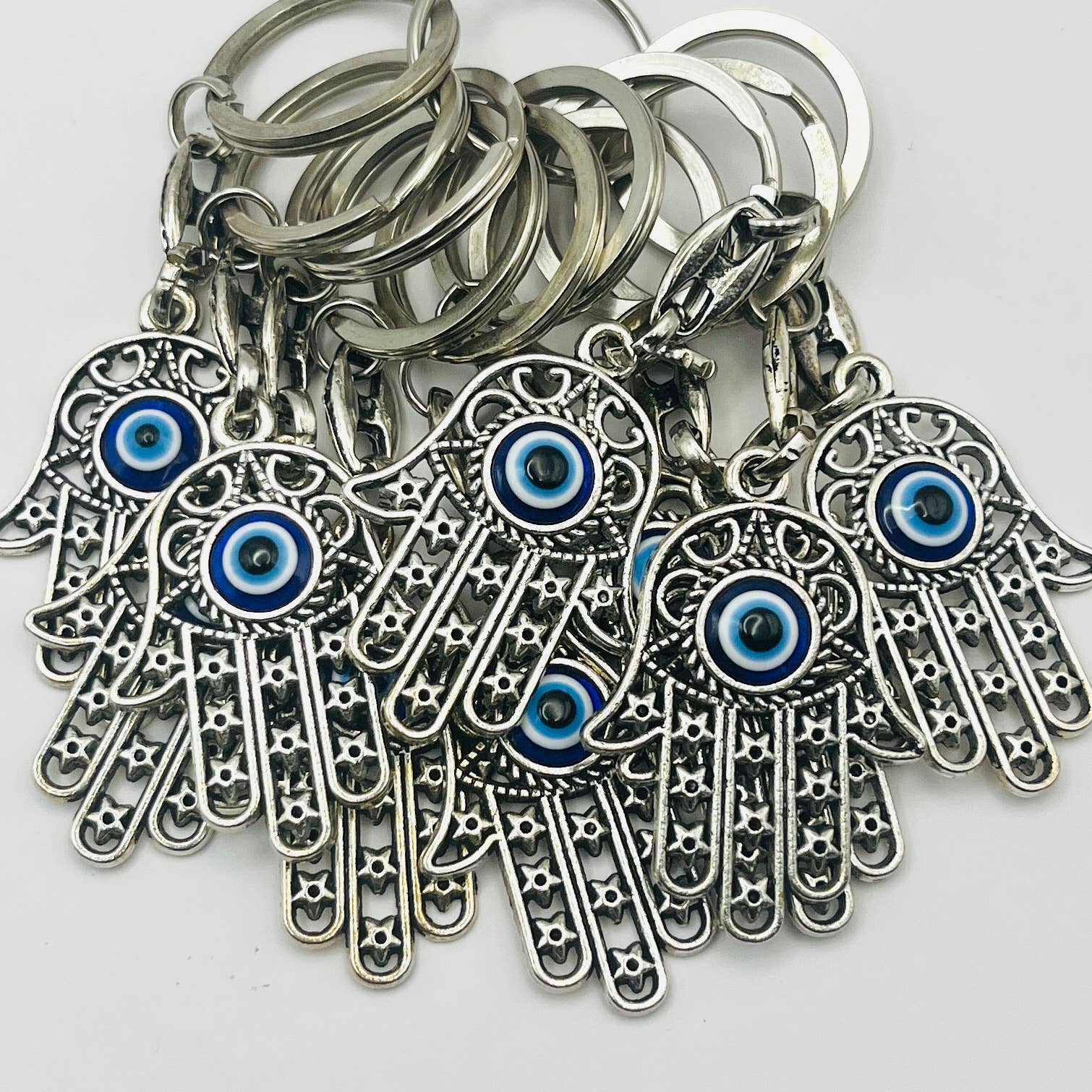 Hamsa Hand Evil Eye Keychain: Protection & Style - Spiral Circle