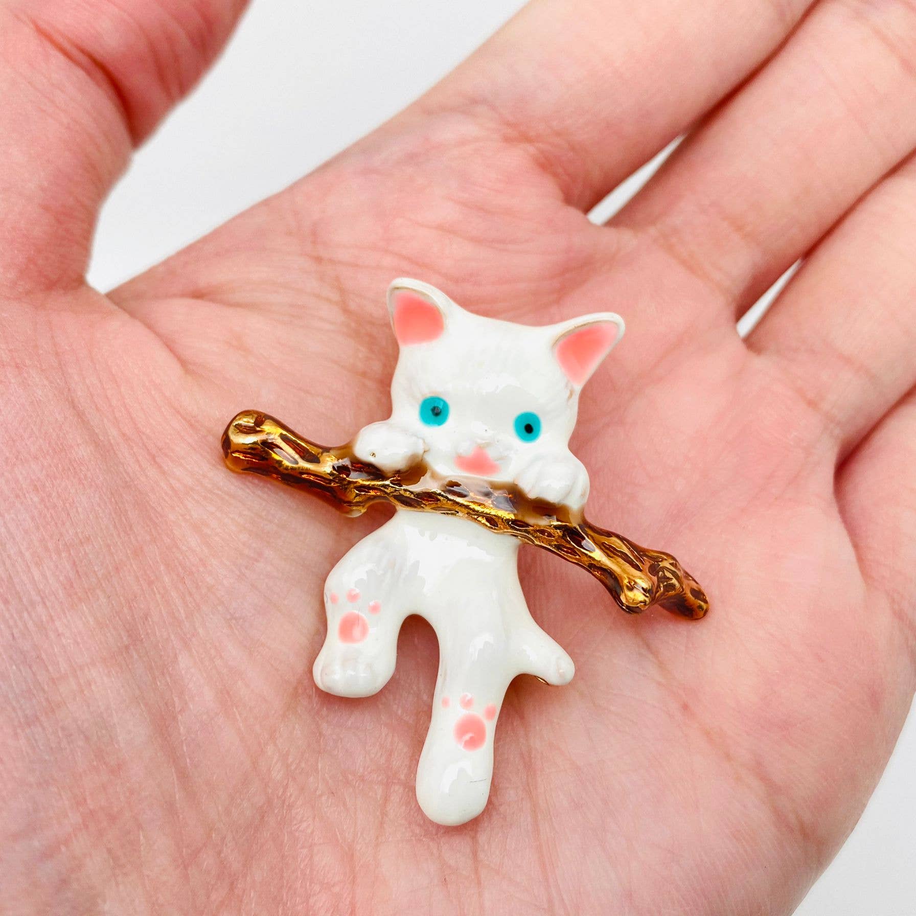 White Cat Hanging On A Branch Enamel Brooch - Spiral Circle