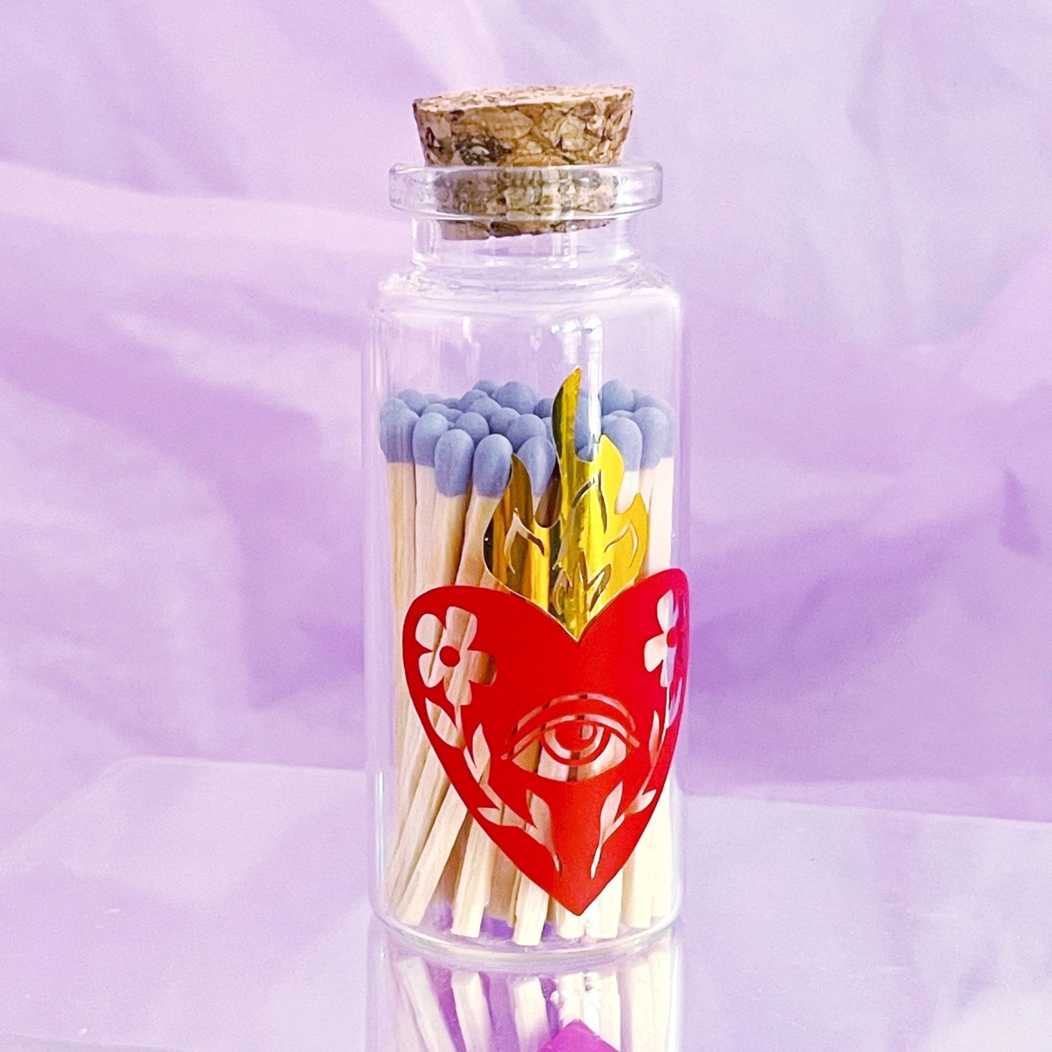 https://www.spiralcircle.com/cdn/shop/products/art-matches-burning-heart-reusable-bottle-177459.jpg?v=1696978449